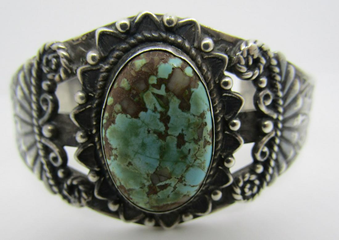 FRED HARVEY ERA TURQUOISE CUFF BRACELET STERLING: EARLY HALLMARKED "MAISELS STERLING ALBUQUERQUE" VINTAGE ESTATE NATIVE AMERICAN SOUTHWEST INDIAN SILVER JEWELRY. TOP MEASURES 35MM. WEIGHS 47.3 GRAMS TESTED STERLING. MEASURES 7.75" WITH A 2" GAP. EXCE