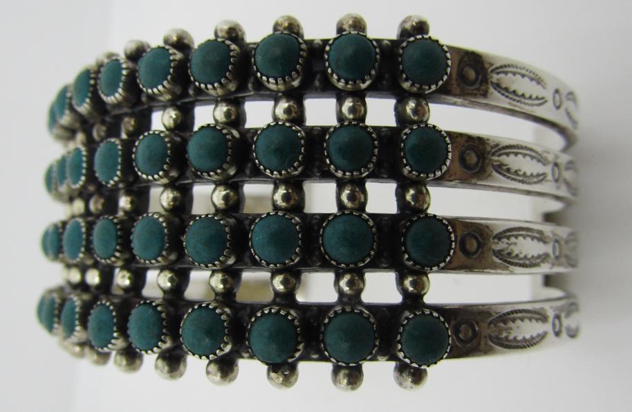 SNAKE EYE TURQUOISE CUFF BRACELET STERLING SILVER: FRD HARVEY ERA 4 ROW CUFF SIGNED "STERLING" VINTAGE ESTATE NATIVE AMERICAN SOUTHWEST NAVAJO INDIAN SILVER JEWELRY. TOP MEASURES 31MM WIDE. WEIGHS 53.6 GRAMS TESTED STERLING. MEASURES 6.75" INSIDE WITH
