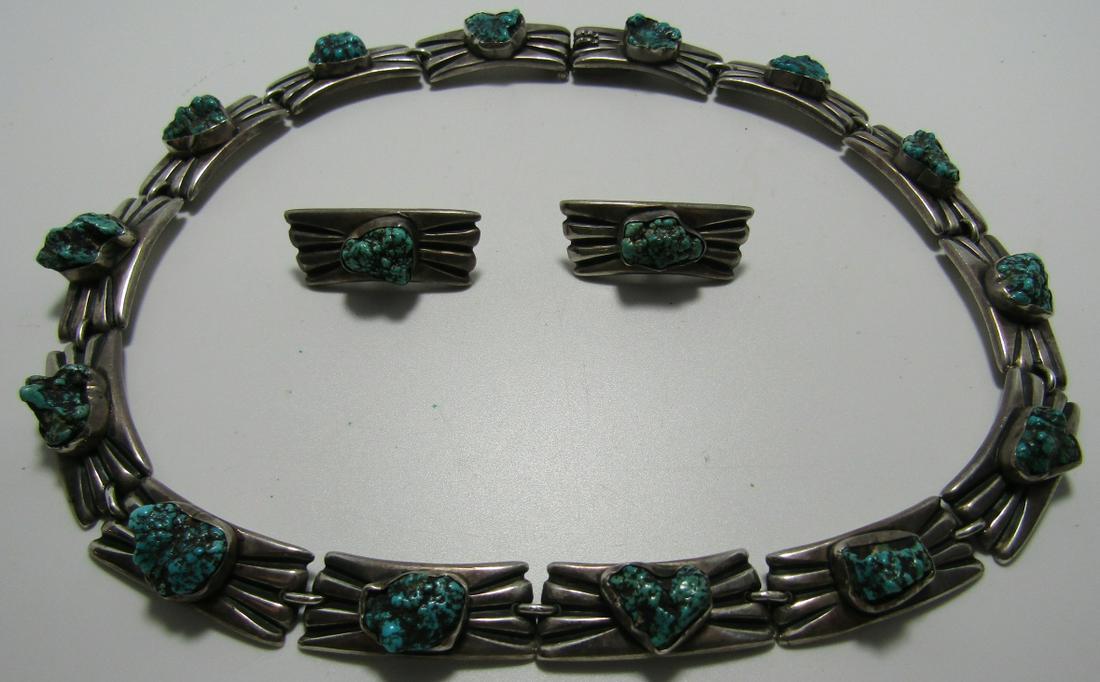 TOM BAHE SPIDERWEB NECKLACE & EARRING SET STERLING: ROUGH NATURAL EDGE TURQUOISE SIGNED "TOM BAHE" NECKLACE AND EARRING SET; WEIGHS 149.7 GRAMS, TESTED STERLING SILVER. VINTAGE ESTATE NATIVE AMERICAN SOUTHWEST NAVAJO INDIAN JEWELRY. EACH LINK 32MM TO 1