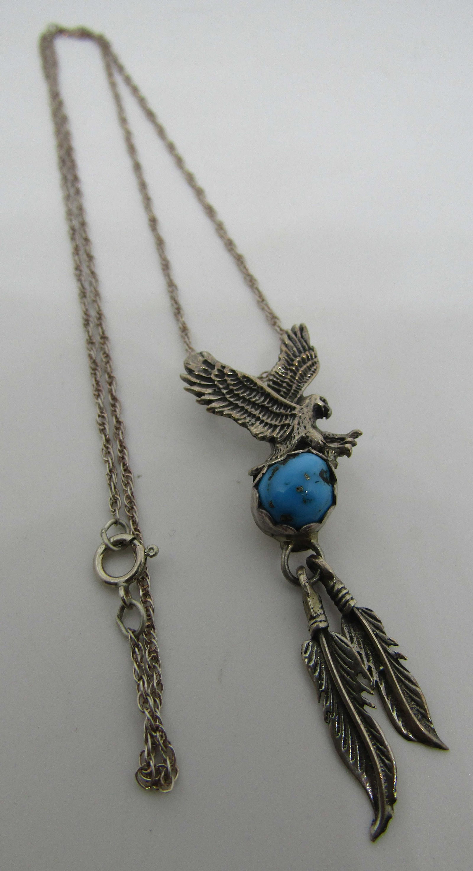 IFS MARK TURQUOISE NECKLACE STERLING SILVER: MARKED "IFS STER" SILVER. ISREAL FREEMAN & SONS. VINTAGE ESTATE NATIVE AMERICAN SOUTHWEST NAVAJO INDIAN JEWELRY. 17" LINK CHAIN PLUS 2" PENDANT. BEZEL MOUNTED WITH 1 TURQUOISE STONE. CHARM MEASURES 47