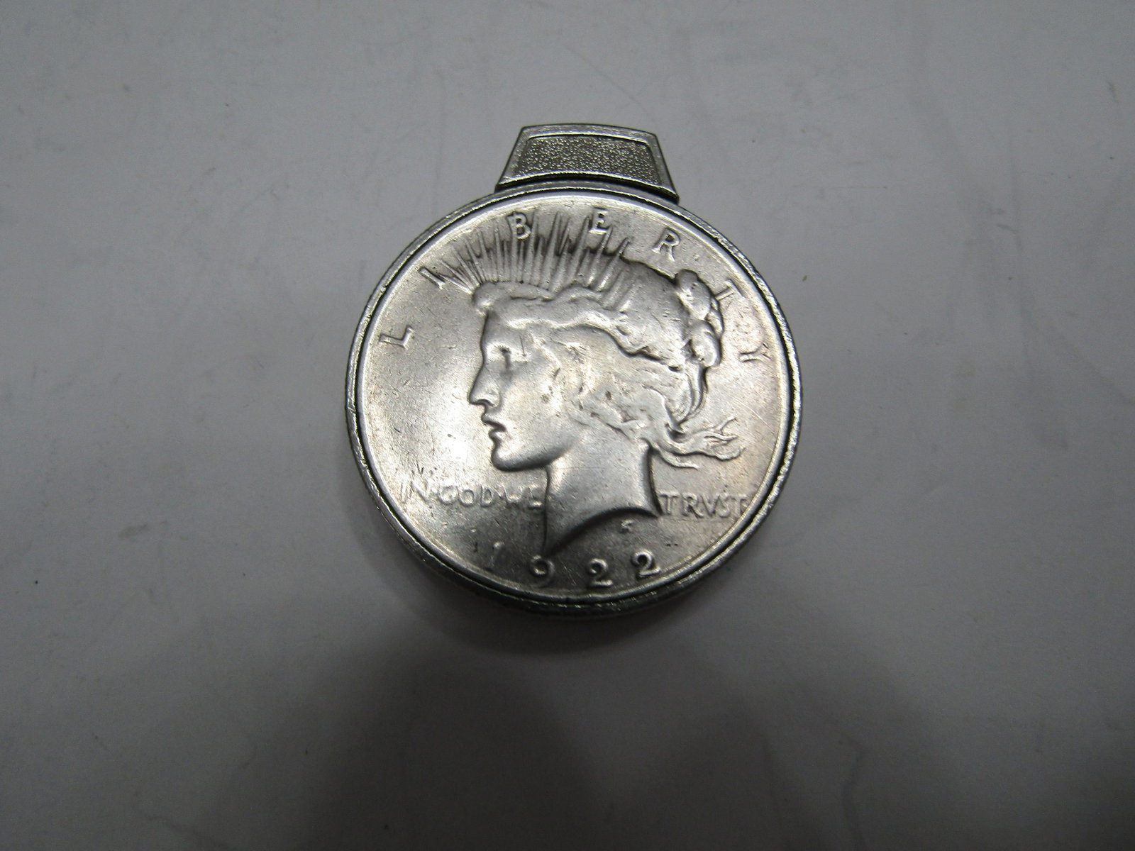 1922 PEACE US SILVER DOLLAR LIGHTER: LIGHTER WITH GENUINE 1922 PEACE DOLLAR . SPRING TOP DOOR. LIGHTER NEEDS FLINT. USA SHIPPING $6