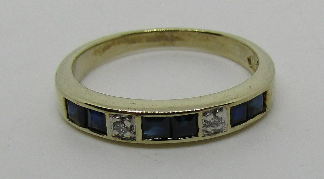SAPPHIRE DIAMOND BAND RING 10K GOLD: GENUINE 6 SAPPHIRES AND 2 DIAMOND RING. MARKED "10K" YELLOW GOLD, WEIGHS 2 GRAMS. 3 MM WIDE. SIZE 5. EXCELLENT CONDITION VINTAGE ESTATE. USA SHIPPING $5