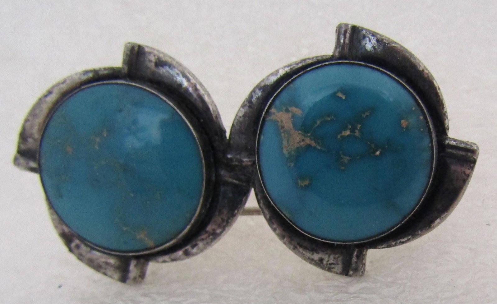 MAISELS TWIN TURQUOISE PIN STERLING SILVER BROOCH: EARLY GENUINE GEM TWIN TURQUOISE PIN HALLMARKED FOR MAISELS AND "STERLING". OLD PAWN NATIVE AMERICAN SOUTHWEST INDIAN JEWELRY. MEASURES 45MM LONG BY 24MM TALL. WEIGHS 12.4 GRAMS. PIN WORKS FINE.VINTAG