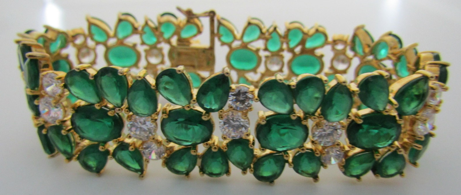 HUGE EMERALD CZ BRACELET GOLD ON STERLING SILVER: FABULOUS VINTAGE ESTATE BRACELET MEASURES 7 3/4 INCHES LONG BY 21.5MM WIDE. INTENDED FOR A 7 1/4" WRIST. WEIGHS 46.5 GRAMS. EXCELLENT CONDITION. USA SHIPPING $5.