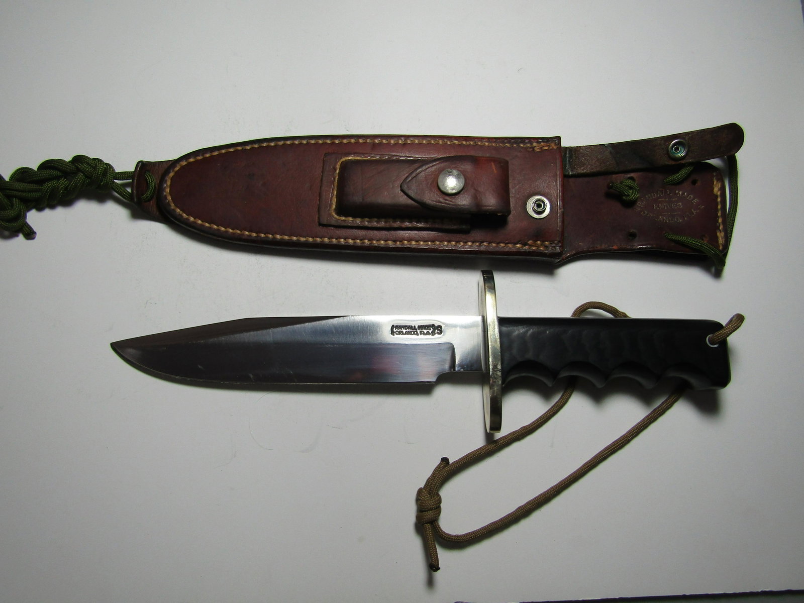 RANDALL KNIFE 14 ATTACK MODEL WITH SHEATH: RANDALL KNIFE 12 INCH LONG WITH 7 1/2 INCH BLADE. BLACK MICARTA GRIP WITH SHEATH AND STONE. USA SHIPPING $18 WITH USPS INSURANCE.