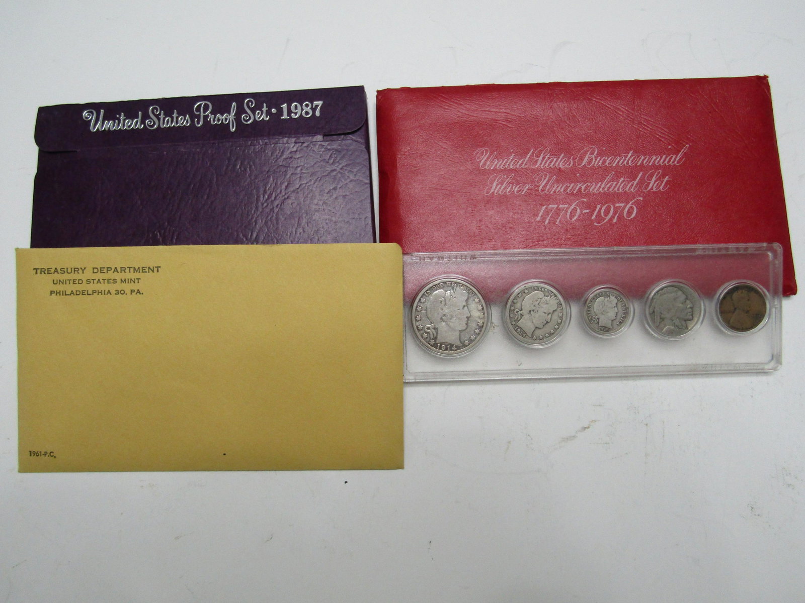4 US COIN SETS 1911 1976 1961 1987: 4 US COIN SETS THE OLD SET HAS MIXED DATE COINS. USA SHIPPING $8