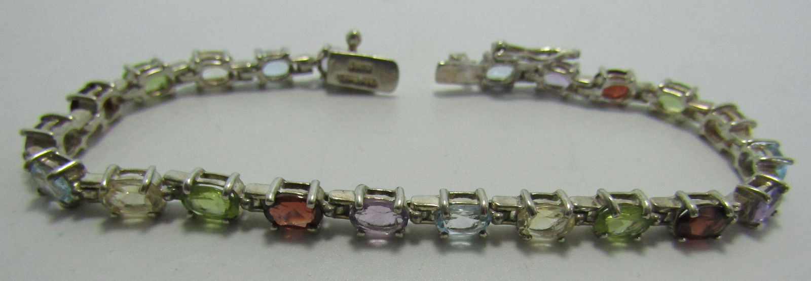 MULTI GEMSTONE TENNIS BRACELET STERLING SILVER. (1 of 3)