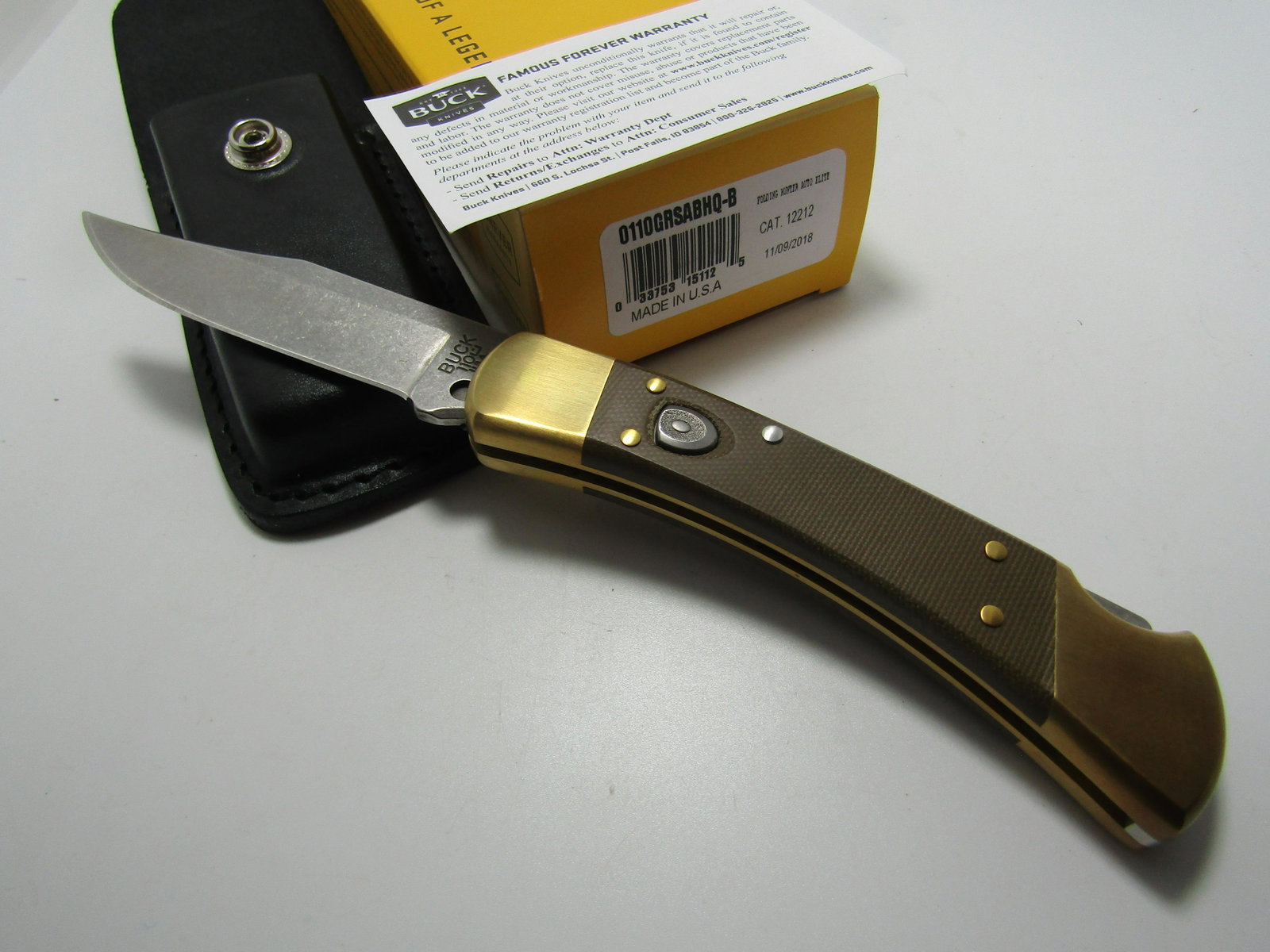 BUCK SWITCHBLADE KNIFE 110 AUTO ELITE: BUCK 110 BROWN AUTO ELITE. NEW IN BOX. 8 3/4 INCH WITH 4 INCH BLADE. USA SHIPPING $15