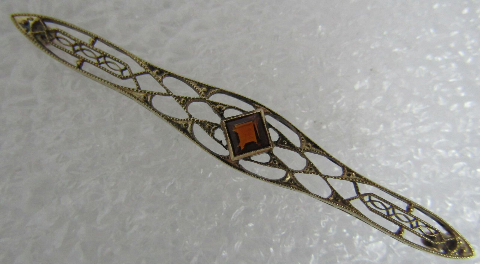 ORANGE GARNET FILIGREE PIN 14K GOLD BROOCH: EDWARDIAN ANTIQUE MARKED AND TESTED "14K" MEASURES 59MM BY 7MM. WEIGHS 2.7GRAMS OF 14K YELLOW GOLD. USA SHIPPING $5.