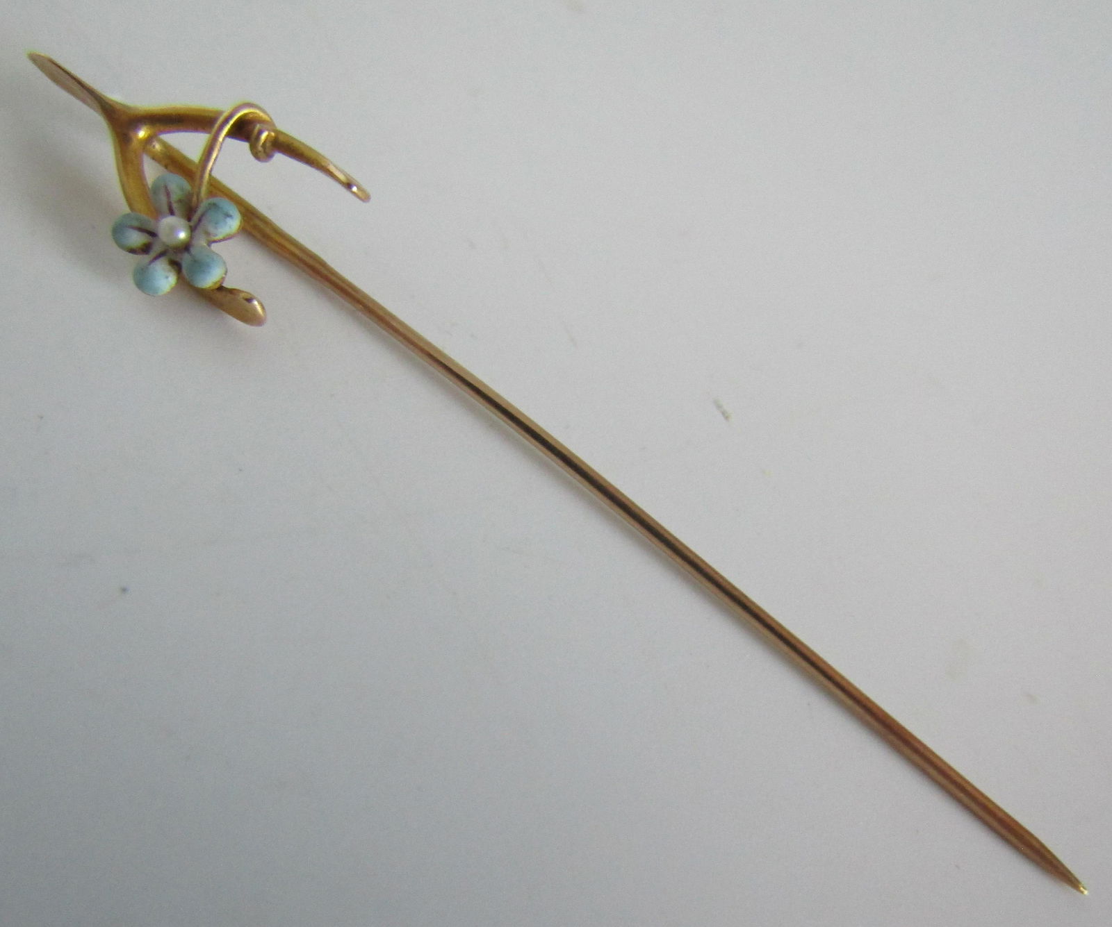 ENAMEL WISHBONE PEARL STICK PIN 14K GOLD: EDWARDIAN ANTIQUE UNMARKED, TESTED 14K. MEASURES 59MM BY 10MM. WEIGHS 1.1GRAMS OF 14K YELLOW GOLD. EXCELLENT CONDITION. USA SHIPPING $5.