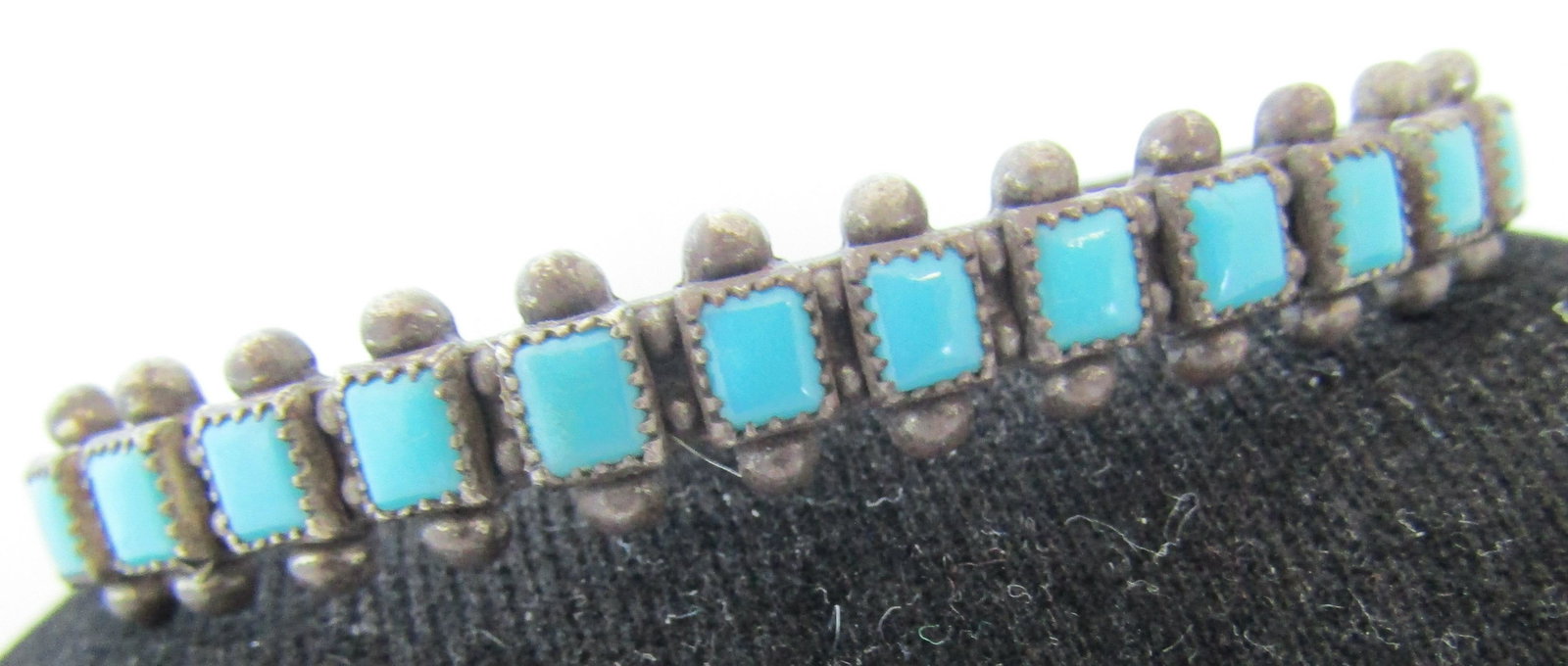 FRED HARVEY ERA TURQUOISE CUFF BRACELET STERLING: BELL TRADING HALLMARK WITH 12 PIECES OF SLEEPING BEAUTY TURQUOISE MARKED "STERLING" OLD PAWN NATIVE AMERICAN SOUTHWEST NAVAJO INDIAN JEWELRY. MEASURE 9.6MM WIDE. WEIGHS 15.6 GRAMS. FITS A 7 1/4 INCH W