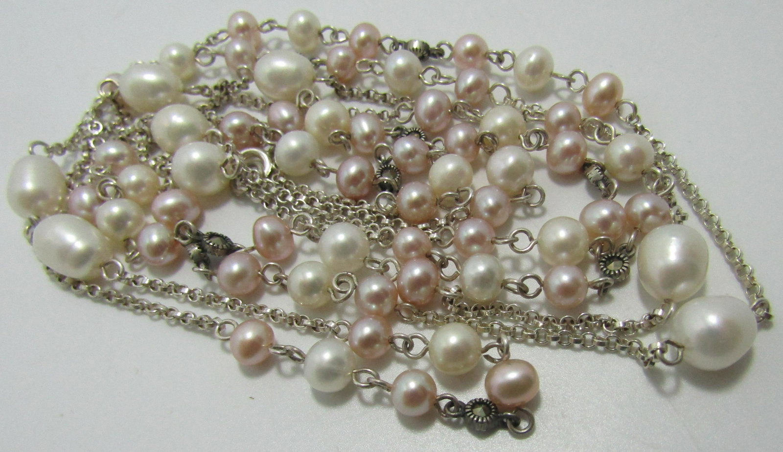 54" PEARL MARCASITE NECKLACE STERLING SILVER: VINTAGE ESTATE 54 INCHES LONG. GRADUATED PINK & WHITE 5MM TO 9MM. WEIGHS 32.4 GRAMS. EXCELLENT USED CONDITION. USA SHIPPING $5.