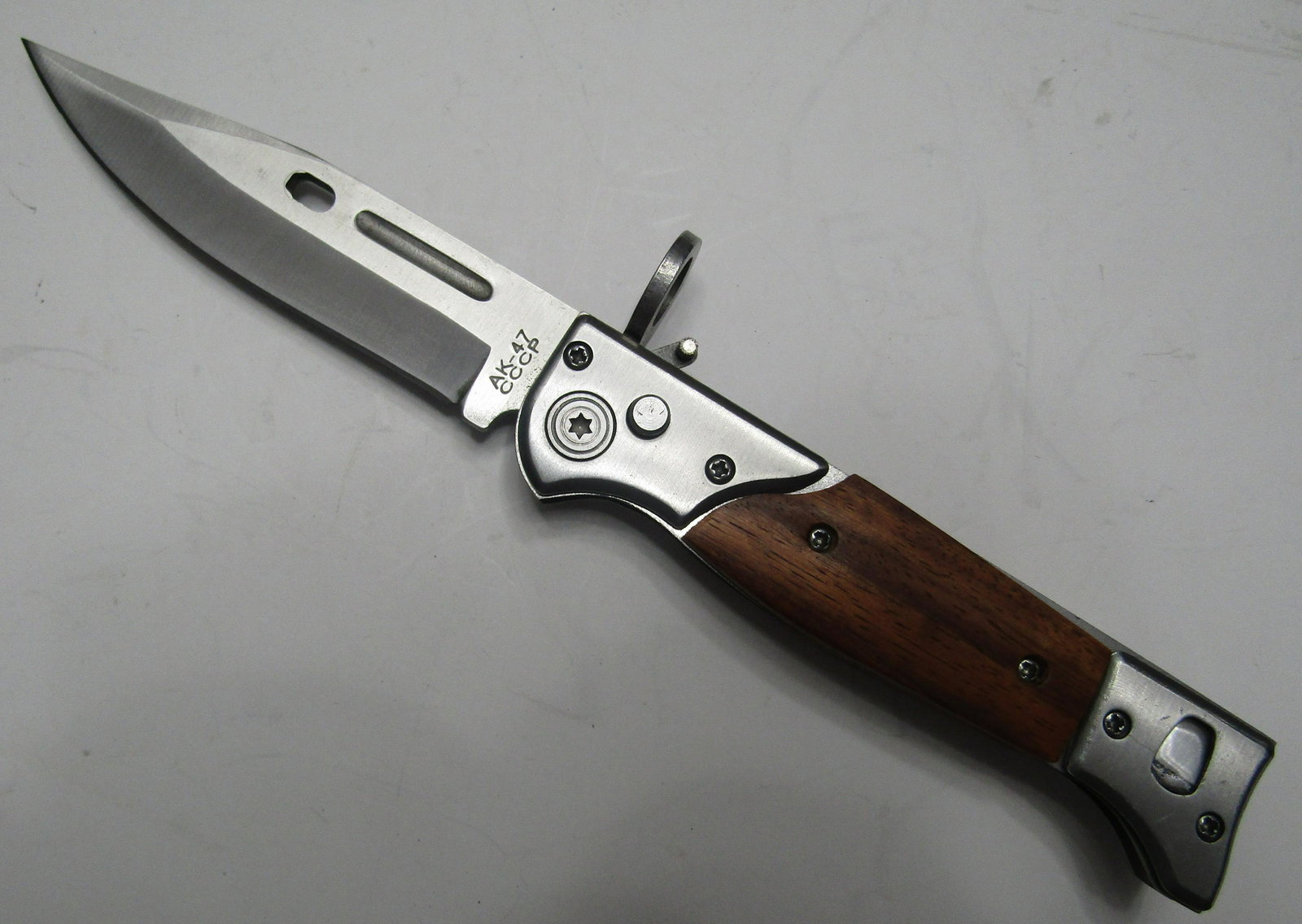 AK-47 SWITCHBLADE KNIFE BAYONET: SWITCHBLADE 9 INCH LONG WITH 4 INCH BLADE.. USA SHIPPING $6