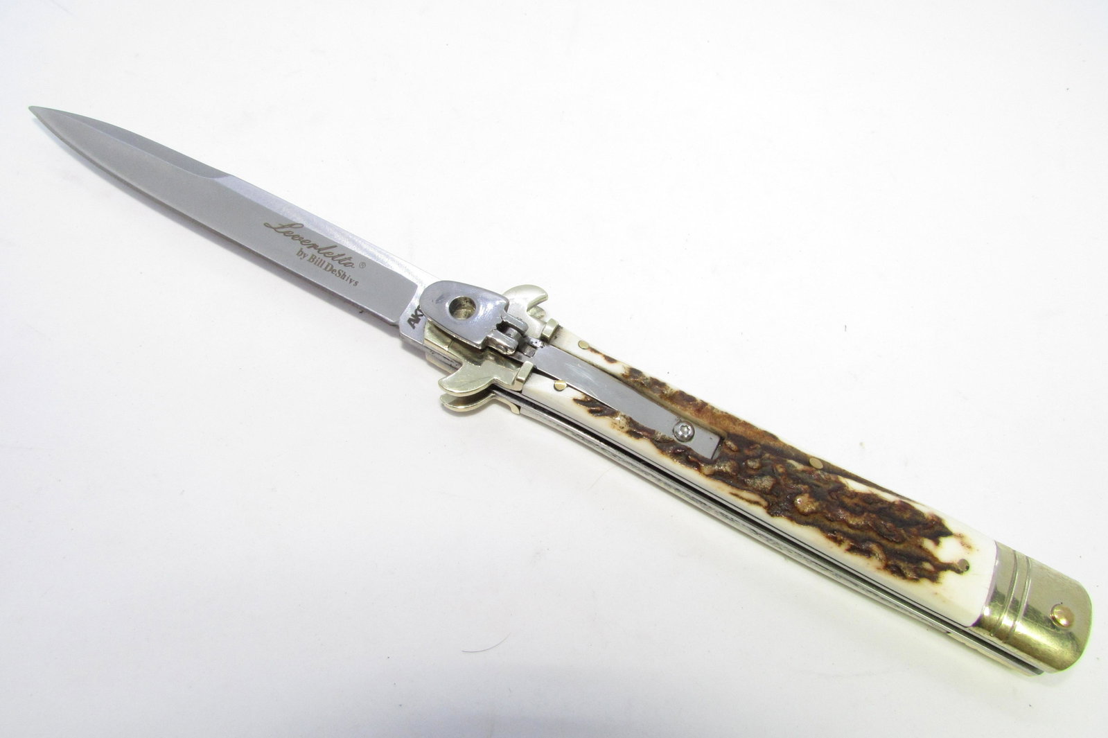 SWITCHBLADE LEVERLETTO STILETTO STAG KNIFE: LEVER ACTION AUTOMATIC KNIFE. 4 1/4" BLADE, 9 9/16" OVERALL. STAG SCALES. VERY SHARP. (US SHIPPING $5)