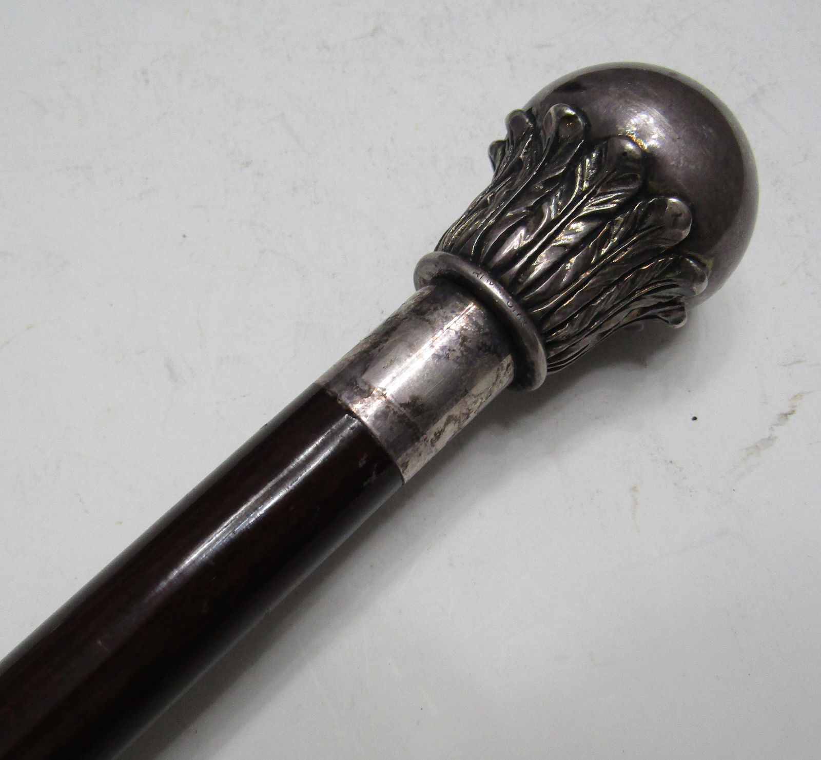 ANTIQUE STERLING SILVER CANE WALKING STICK: LARGE STERLING SILVER MARKED ROUND KNIOB ON A LEAF PEDESTAL. 1 1/2 INCH ACROSS AND 3 1/4 INCH LONG. NO DENTS OR DINGS. HALLMARKED RI 925. CANE IS 36 INCH LONG . USA SHIPPING $18