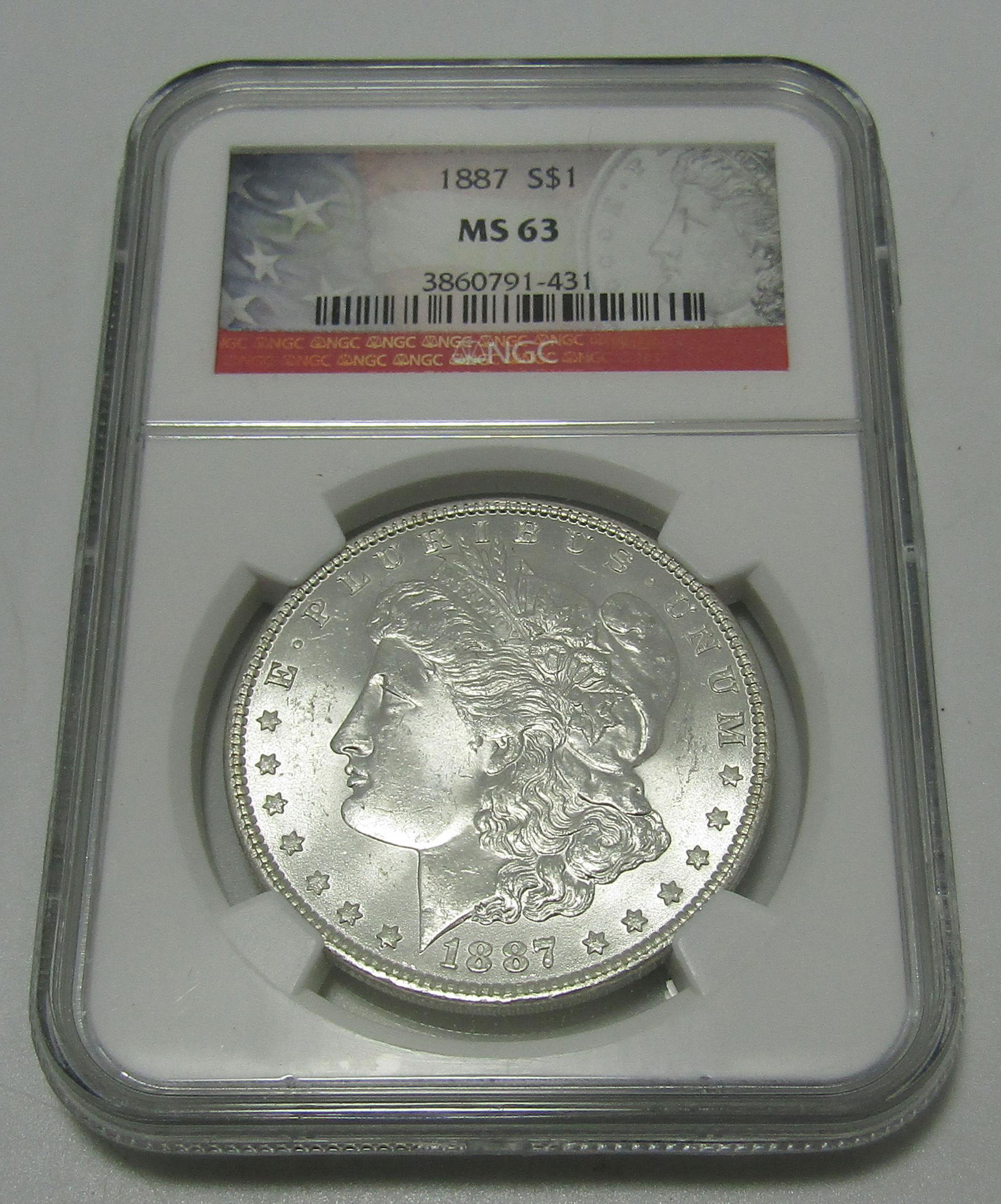 1887 MORGAN SILVER DOLLAR MS 63 NGC US COIN (1 of 2)