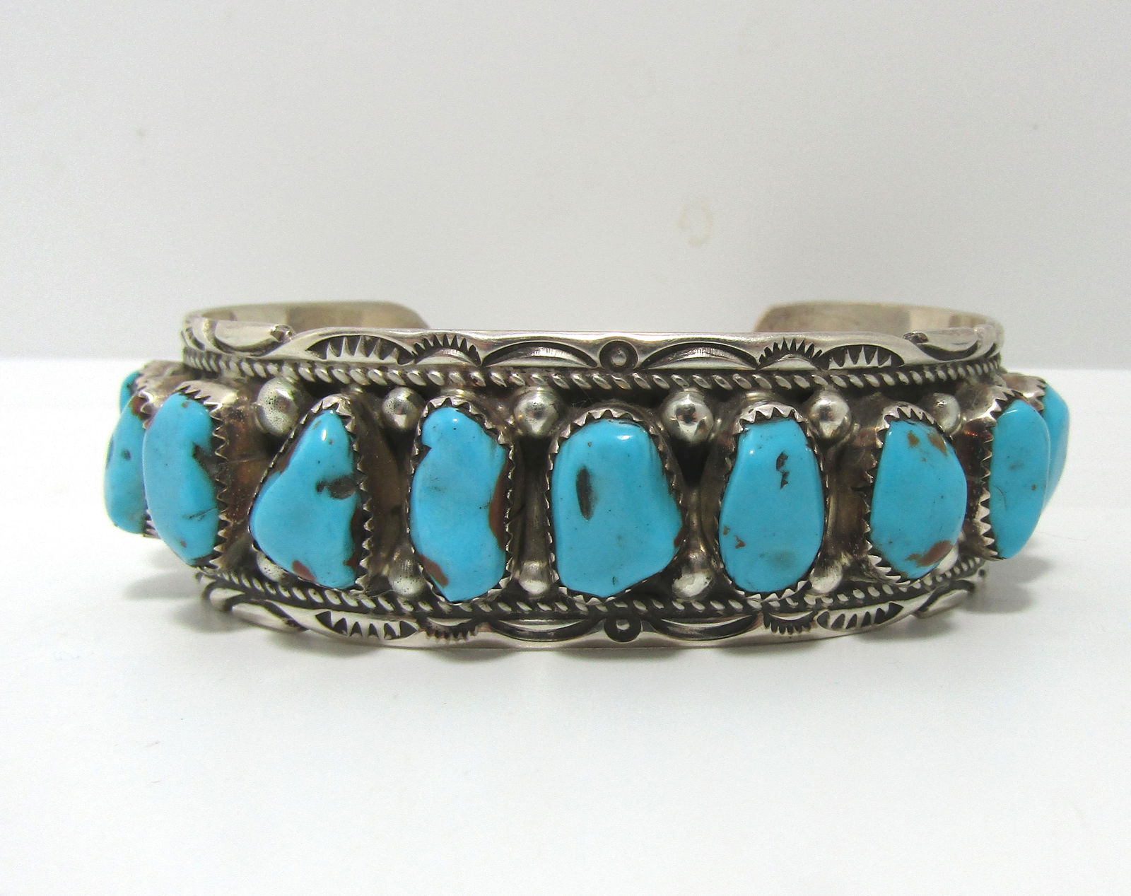 YAZZIE 11 STONE TURQUOISE STERLING CUFF BRACELET (1 of 4)