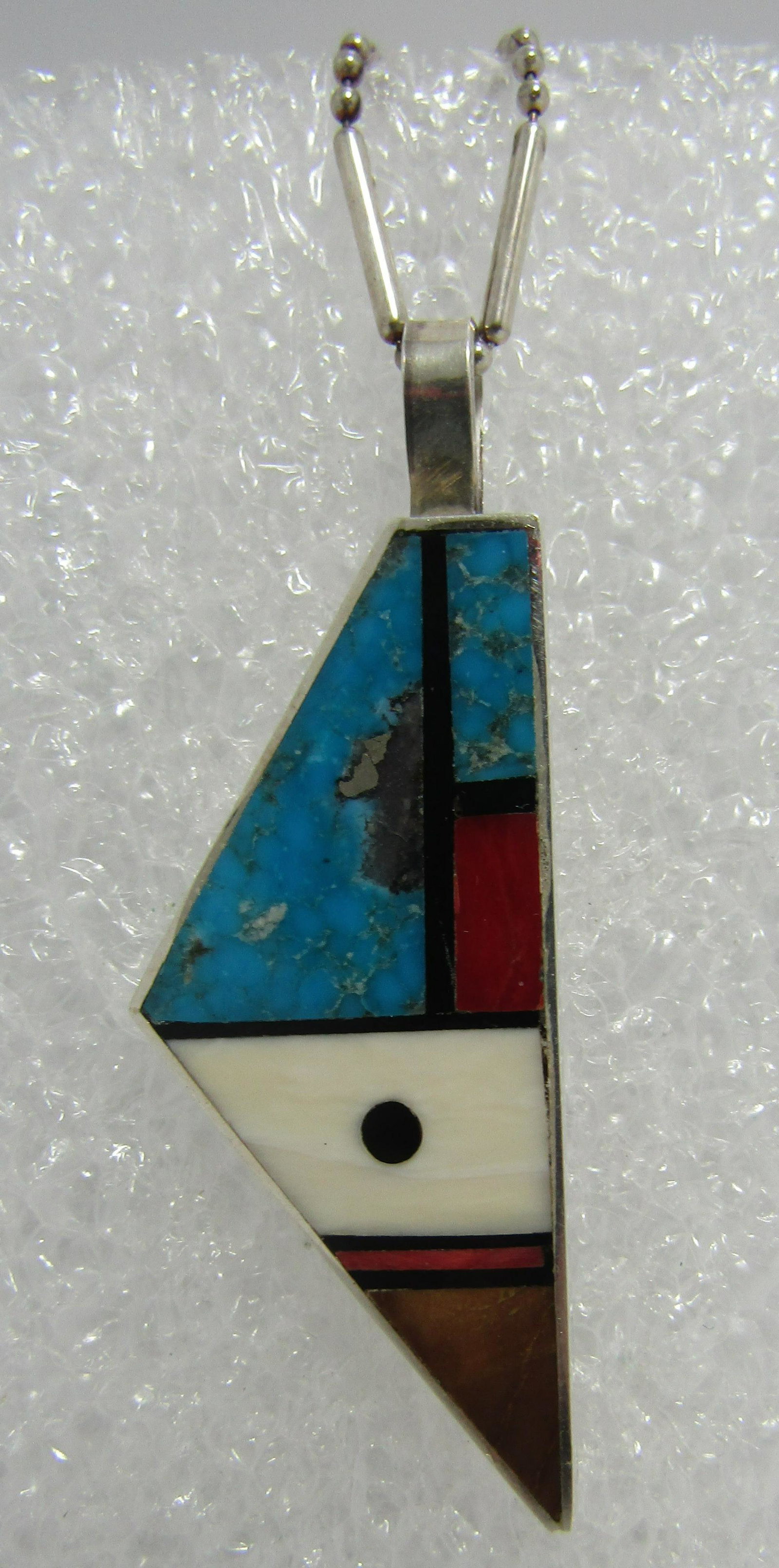 HAROLD SMITH INLAY NECKLACE STERLING SILVER PENDAN: UNSIGNED HAROLD SMITH; TESTED STERLING SILVER; INLAID WITH TURQUOISE, CORAL, TIGER EYE, JET / ONYX. NATIVE AMERICAN SOUTHWEST NAVAJO INDIAN JEWELRY. PENDANT MEASURES 54MM BY 20MM WIDE WITH A 24" CHAIN