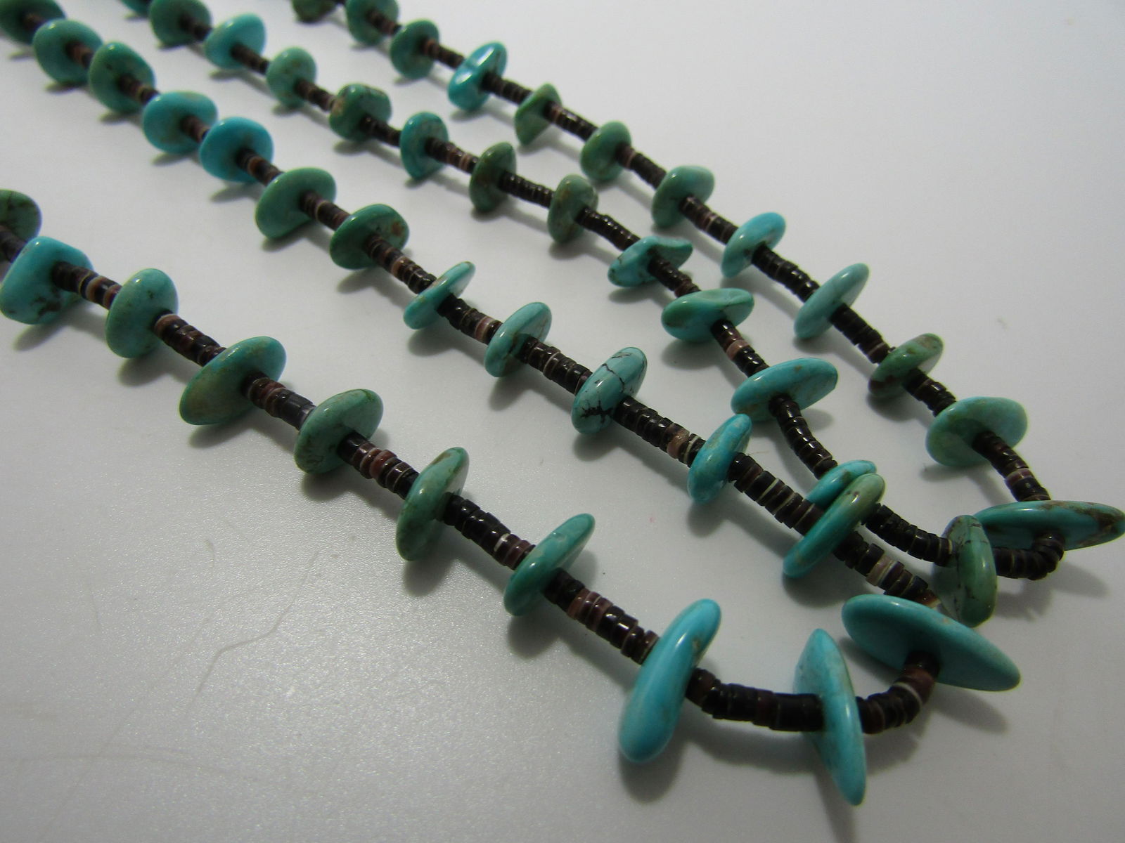 TWO MATCHING TURQUOISE HEISHI SHELL NECKLACES (1 of 5)