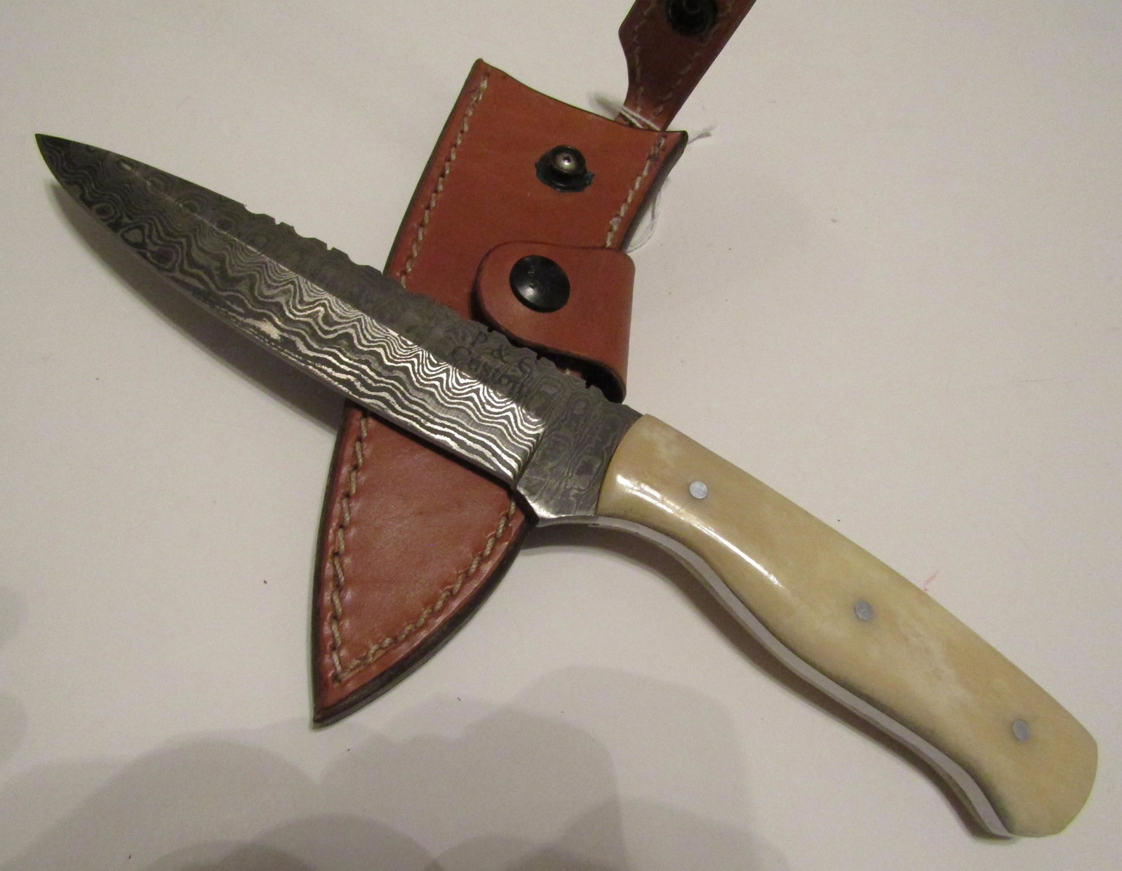 P AND C CUSTOM DAMASCUS HUNTING KNIFE: 11 INCH HUNTING KNIFE WITH 6 INCH DAMASCUS BLADE 1 1/4 INH WIDE WITH BONE GRIP WITH SHEATH. US SHIPPING $5