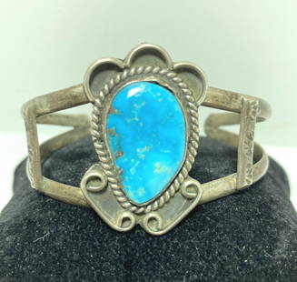 NAVAJO STERLING TURQUOISE CUFF BRACELET: VINTAGE OLD PAWN NATIVE AMERICAN NAVAJO HANDMADE CUFF BRACELET. UNMARKED UNSIGNED. TESTED STERLING SILVER. WEIGHS 23 GRAMS. FRONT MEASURES 1-1/2" TALL. GAP IS 1-1/4" AND FITS 6-1/4" WRIST TOTAL.