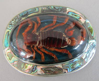 SCORPION & ABALONE SHELL BELT BUCKLE: BELT BUCKLE WITH SCORPION SET IN PLASTIC WITH ABALONE SHELL ON ALPACA METAL BUCKLE. 4 " BY 3". USA SHIPPING $5