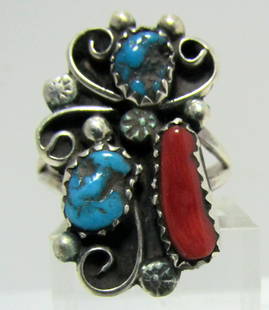 "LMC" TURQUOISE CORAL RING STERLING SILVER SIZE 7: TURQUOISE & CORAL RING MARKED "LMC STERLING" VINTAGE ESTATE NATIVE AMERICAN SOUTHWEST NAVAJO INDIAN JEWELRY. TOP MEASURES 25MM BY 16MM. WEIGHS 4.6 GRAMS. SIZE 7. EXCELLENT USED