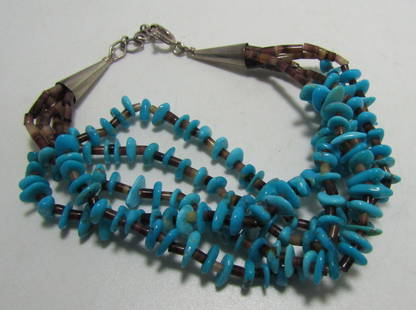 TURQUOISE NUGGET HEISHI BRACELET STERLING SILVER: 5 STRANDS OF GENUINE TURQUOISE NUGGETS & HEISHI BEAD BRACELET MARKED "STERLING". VINTAGE ESTATE NATIVE AMERICAN SOUTHWEST ZUNI / NAVAJO INDIAN JEWELRY. MEASURES 7.75 INCHES LONG BY 20MM 
