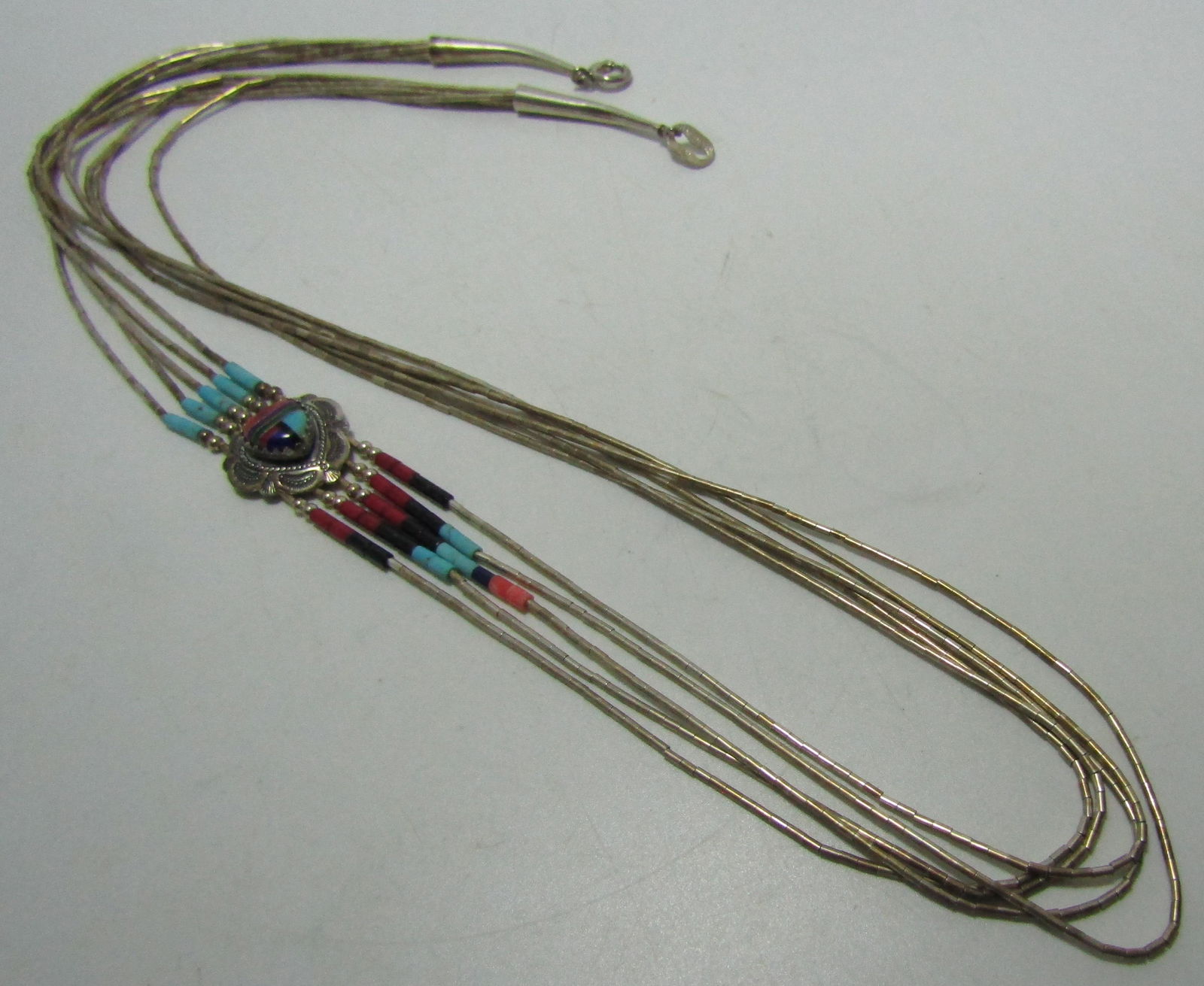 INLAY TURQUOISE LAPIS MALACHITE NECLACE STERLING: INLAID WITH TURQUOISE, LAPIS, MALACHITE CORAL AND OTHERS. MARKED "STERLING". VINTAGE ESTATE NATIVE AMERICAN SOUTHWEST INDIAN JEWELRY. 5 STRAND LIQUID SILVER CHAIN MEASURES 24" LONG INCLUDING 2" BEADED