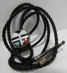 INLAY SUNFACE BOLO TIE NECKLACE STERLING SILVER: INLAID SUNFACE WITH TURQUOISE, CORAL, MOP & JET. 37 INCH LONG BRAIDED LEATHER WITH TESTED STERLING SILVER BOLO 25MM BY 25MM & TIPS. VINTAGE ESTATE NATIVE AMERICAN SOUTHWEST ZUNI OR NAVAJO