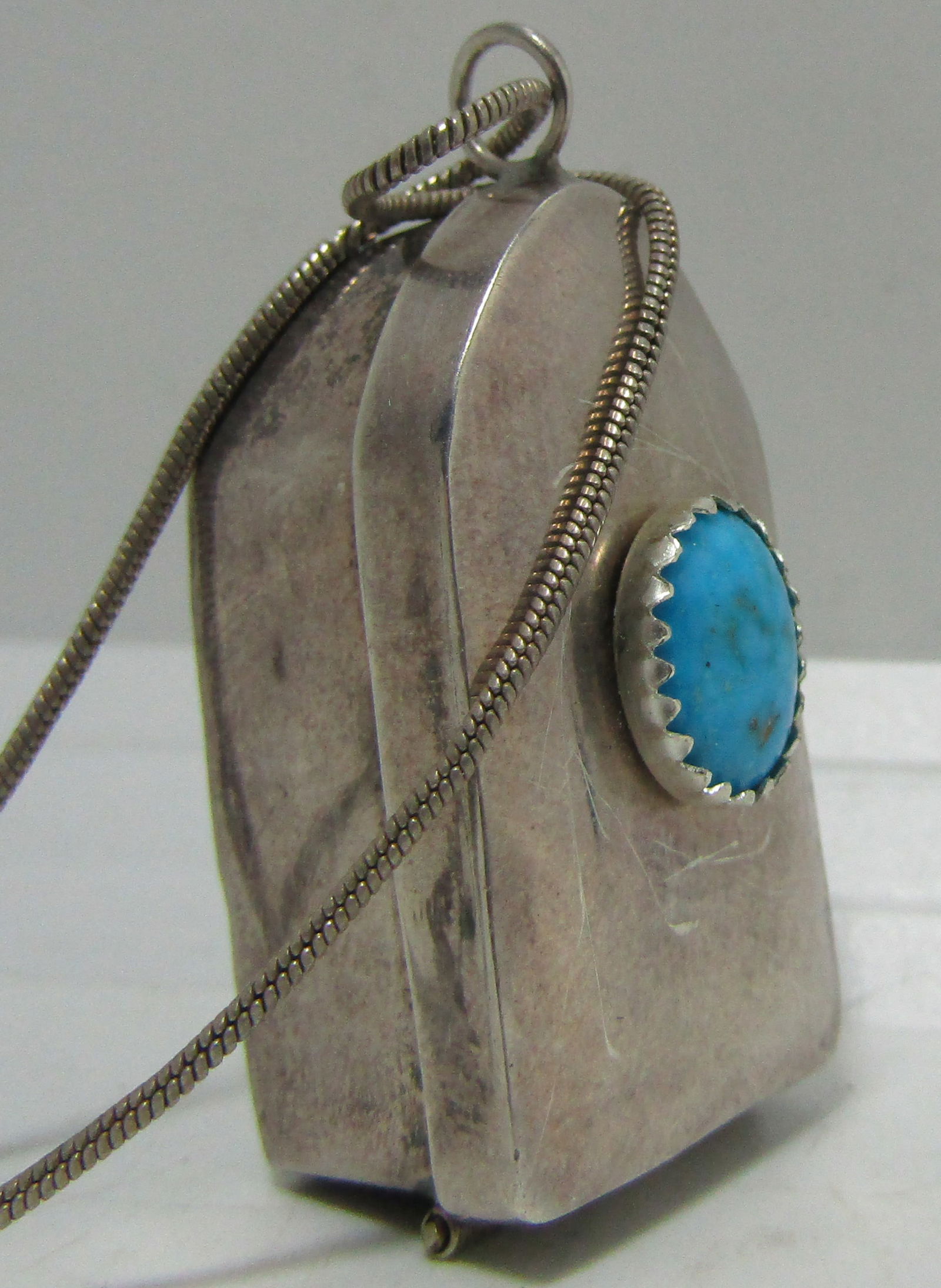 TURQUOISE PILL BOX PENDANT NECKLACE STERLING SILVE: SIGNED TAXCO IC-02 IGUALA CC9. TESTED & MARKED STERLING SILVER. SNAKE CHAIN IS 18". TRINKET BOX MEASURES 1-3/8" X 3/4". TOTAL WEIGHS 14 GRAMS. USA SHIPPING $5.
