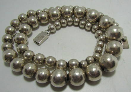 TM-298 TAXCO MEXICO 18MM BEAD 24" NECKLACE 925: MID CENTURY MARKED "925 MEXICO TM-298" 24 INCH LONG FINE STERLING SILVER TAXCO GRADUATED BEAD NECKLACE, 8MM TO 18MM. WEIGHS. 110.0 GRAMS. STRUNG ON STERLING LINK CHAIN. USA SHIPPING $5.