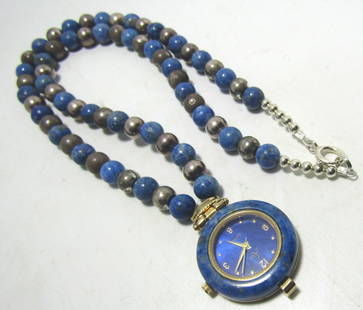 DENIM LAPIS BEAD NECKLACE STERLING SILVER WATCH: 23 INCH LONG STRAND OFGENUINE 8MM DENIM LAPIS STONE AND STERLING SILVER BEADS WITH A 1.5" ARIA WATCH SURROUNDED WITH MORE LAPIS.. WEIGHS 59.2 GRAMS. WATCH IS RUNNING. EXCELLENT CONDITION. USA SHIPPING