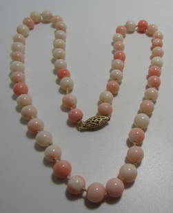 7MM CORAL BEAD NECKLACE 14K GOLD 19" STRAND: STRAND MEASURES 19 INCHES LONG. WEIGHS 28.7 GRAMS. 14K YELLOW GOLD FILIGREE CATCH. EXCELLENT USED CONDITION. USA SHIPPING $5.
