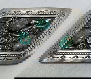 50 GRAM STERLING NAVAJO TURQUOISE BELT BUCKLE: NATIVE AMERICAN HANDMADE OLD PAWN PIECE. TURQUOISE STONES HAVE GORGEOUS WATERWEB SPIDERWEB MATRIX. UNSIGNED MARKED TESTED STERLING SILVER. WEIGHS 50 GRAMS. MEASURES 2.75" X 2" AND FITS 1.5" BELT. USA