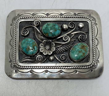 50 GRAM STERLING NAVAJO TURQUOISE BELT BUCKLE: NATIVE AMERICAN HANDMADE OLD PAWN PIECE. TURQUOISE STONES HAVE GORGEOUS WATERWEB SPIDERWEB MATRIX. UNSIGNED MARKED TESTED STERLING SILVER. WEIGHS 50 GRAMS. MEASURES 2.75" X 2" AND FITS 1.5" BELT. USA