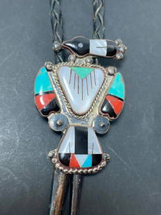 SIGNED J STERLING PEYOTE BIRD TURQUOISE BOLO TIE: VINTAGE NATIVE AMERICAN HANDMADE BOLO TIE NECKLACE. HAS MULTICOLOR INLAID STONES INCLUDING TURQUOISE RED CORAL ONYX AND MOTHER OF PEARL. TESTED STERLING SILVER. WEIGHS 30 GRAMS INCLUDING LEATHER. MEAS