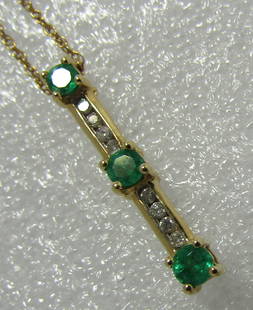 14KT GOLD EMERALD DIAMOND PENDANT NECKLACE: PAST PRESENT FUTURE PENDANT. ALL 14K WEIGHS 2.8 GRAMS. PENDANT IS 1" LONG, NECKLACE IS 18" LONG. EXCELLENT CONDITION. USA SHIPPING $5..