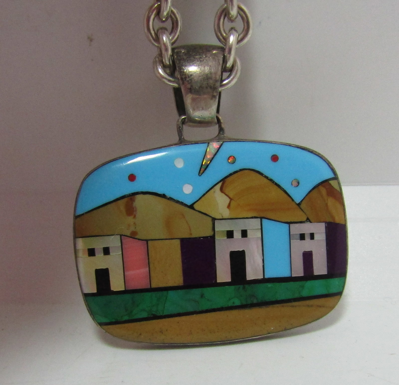 "CV" MICRO INLAY PENDANT NECKLACE STERLING SILVER: ARTIST SIGNED "CV STERLING" NATIVE AMERICAN SOUTHWEST INDIAN JEWELRY. MEASURES 20 INCHES LONG PLUS A 40MM BY 36MM GEMSTONE DROP. WEIGHS 39.8GRAMS. EXCELLENT CONDITION. USA SHIPPING $5.