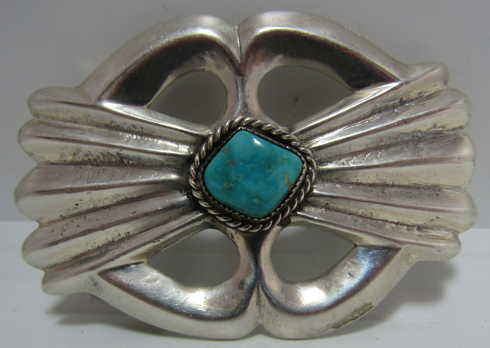 TUFA SAND CAST BELT BUCKLE WATERWEB TURQUOISE: UNMARKED; TESTED STERLING SILVER. NATIVE AMERICAN SOUTHWEST NAVAJO INDIAN JEWELRY. MEASURES 75MM BY 53MM. WEIGHS 58.1 GRAMS. WILL HOLD A 1 1/4" BELT. .EXCELLENT CONDITION. USASHIPPING $5.