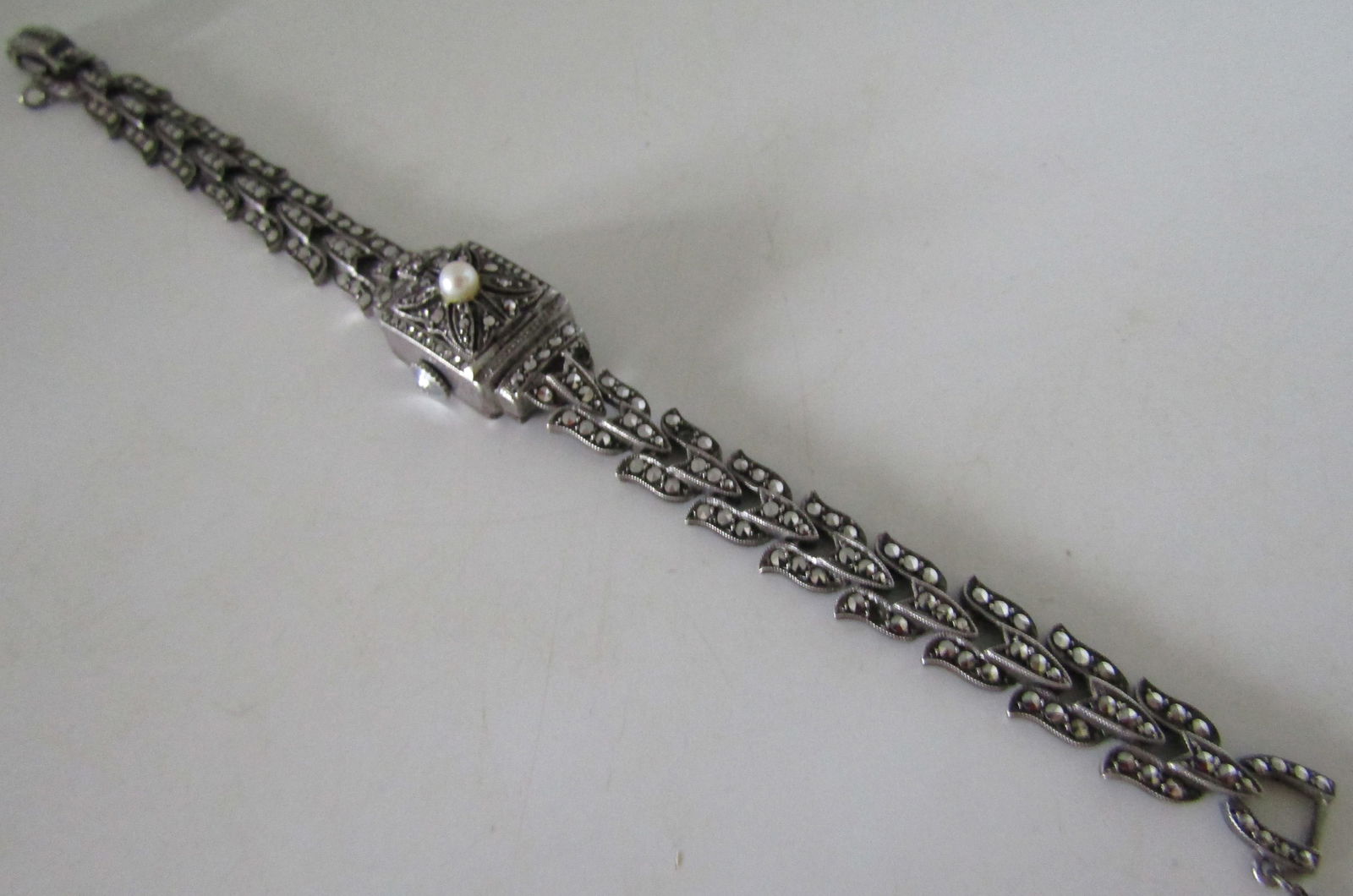 800 SILVER BUCHERER WATCH 17JEWEL MARCASITE: DOOR WATCH MEAURES 7 INCHES LONG BY 16MM WIDE. 800 SILVER. USA SHIPPING $5