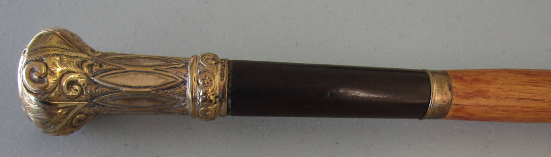 WJB & CO GOLD CANE WALKING STICK ANTIQUE: 36 INCH ROLLED GOLD KNOB CANE SIGNED WJB AND CO. ON 3/4 INCH WOODSHAFT. 1 1/2 BY 3" KNOB. USA SHIPPING $5.WITH INS.