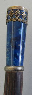 LAPIS LAZULI STONE ROLLED GOLD CANE WALKING STICK: 36 INCH CANE WITH LAPIS AND GOLD FILLED TRIM ON A 5/8 INCH WOOD SHAFT. KNOB IS 1"BY 2 1/2". NO VISIBLE HALL MARKS. USA SHIPPING $5.WITH INS.