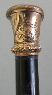 1880 SIGNED GOLD CANE WALKING STICK PRESENTATION: 35 INCH ROLLED GOLD KNOB CANE. SIGNED " TOP.P. MEEKER FROM JNO. B. MORFORD JAN 31 1880" 1 1/4 INCH BY 1 INCH KNOB ON 1/2INCH WOOD SHAFT. NO VISIBLE HALLMARKS. USA SHIPPING $5.WITH INS.