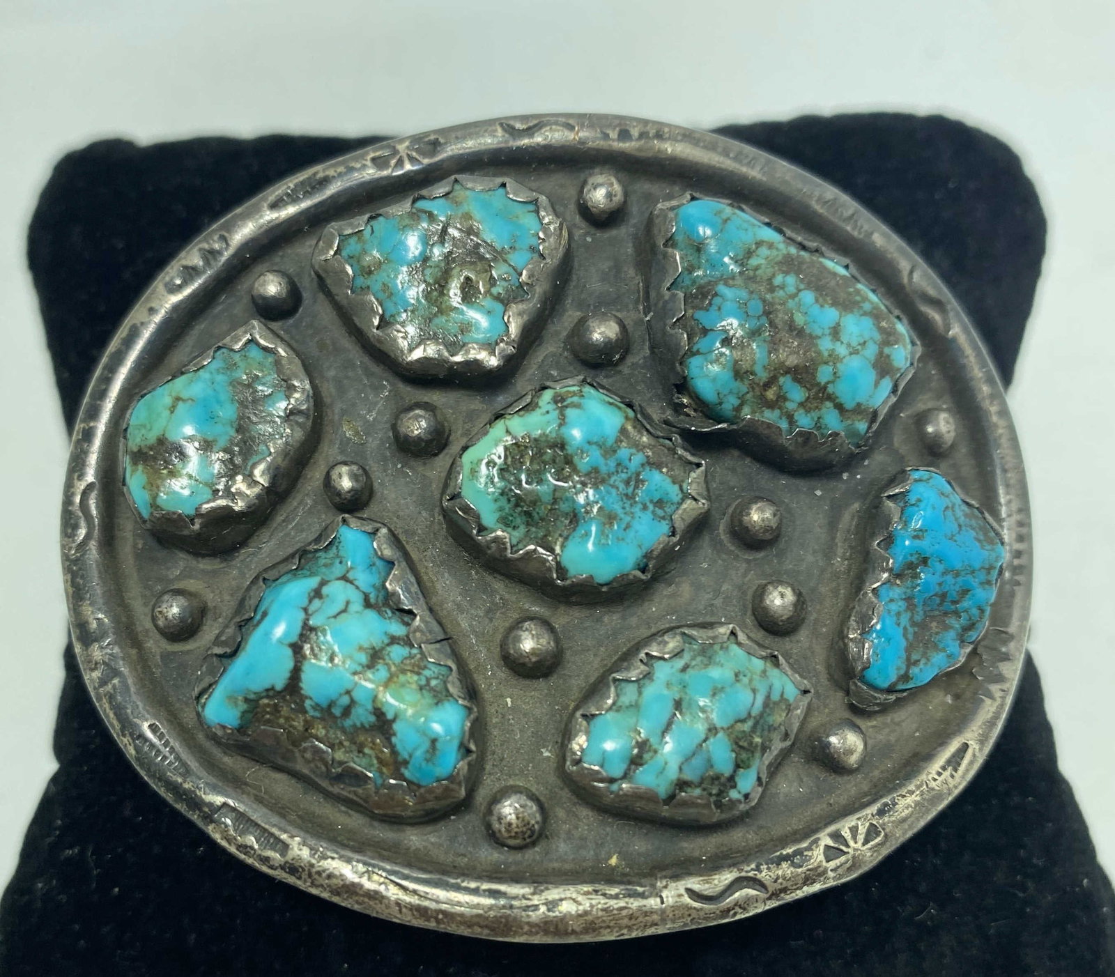 1960S OLD PAWN STERLING TURQUOISE BELT BUCKLE: UNIQUE SIGNED "FF" NATIVE AMERICAN NAVAJO BELT BUCKLE. GORGEOUS SPIDERWEB MATRIX ON THESE OLD TURQUOISE STONES. TESTED STERLING SILVER. WEIGHS 63.7 GRAMS MEASURES 2-5/8" X 2-1/8". FITS 1-1/4" BELT LEA