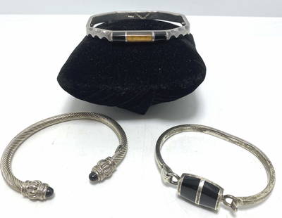 93 GRAMS STERLING ONYX BRACELETS MEXICO TAXCO LOT: TIGERSEYE HINGED BANGLE MARKED TN-56 MEXICO 950. OTHER TWO MARKED 925 MEXICO. DAVID YURMAN STYLE TWISTED CABLE CUFF FITS 8" WRIST OR LESS. OTHER TWO FIT 6.25" WRIST. WEIGHS 93 GRAMS TOTAL. ALL