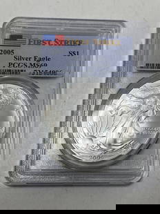 PCGS 2005 MS69 FIRST STRIKE SILVER EAGLE US DOLLAR: FIRST STRIKE MS69 US ONE DOLLAR 1 OZ FINE SILVER COIN. GRADED PCGS. USA SHIPPING $5. NO INTERNATIONAL SHIPPING OUTSIDE THE USA.