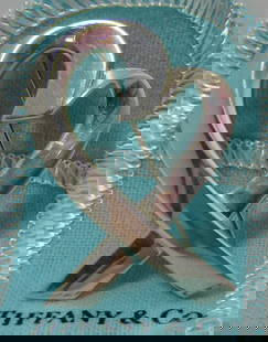 TIFFANY & CO HEART PIN PALOMA PICASSO STERLING SIL: GENUINE SIGNED "TIFFANY & CO. PALOMA PICASSO 925" STERLING SILVER. MEASURES 1 3/4 INCHES BY 1 1/4". WEIGHS 10.6 GRAMS. EXCELLENT VINTAGE ESTATE CONDITION. WITH A POUCH. USA SHIPPING $5. 