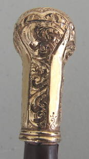 ANTIQUE GOLD KNOB CANE WALKING STICK: ANTIQUE 31.5 INCH LONG WITH A ROLLED GOLD KNOB CANE. ON A 3/8 INCH WOODSHAFT. WITH A 1" BY 1 3/4" KNOB. USA SHIPPING $5. NO INTERNATIONAL SHIPPING OUTSIDE THE USA.