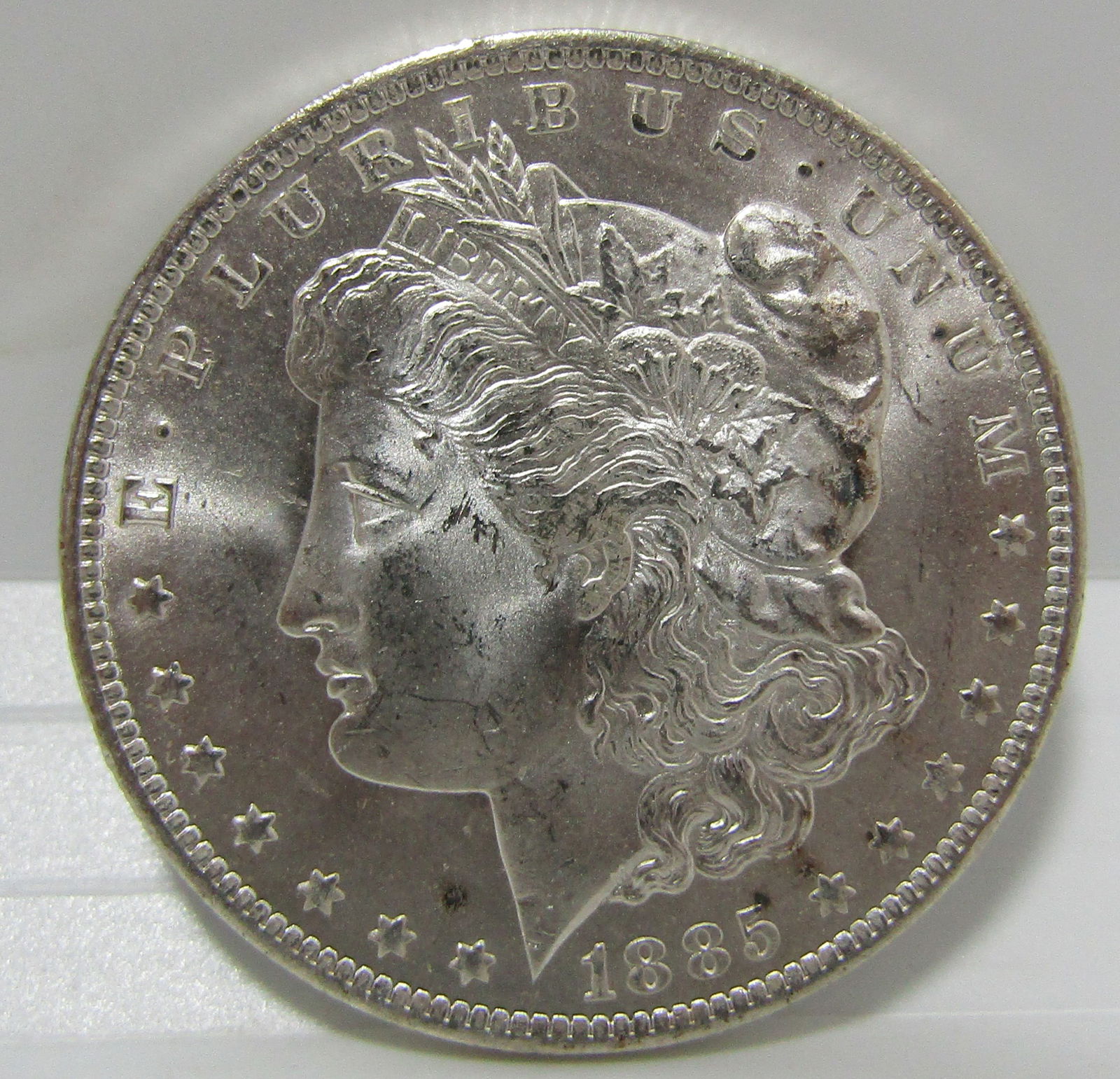 1885 O SILVER MORGAN DOLLAR UNC (1 of 2)